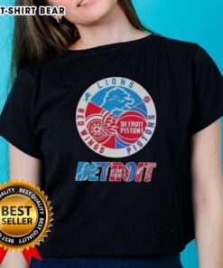 Alt Text: Top Detroit City Sports ladies tee featuring logos of Lions, Pistons, and Red Wings for sports fans.