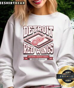 Top Detroit Red Wings heater sweatshirt in red with logo, perfect for fans to stay warm at games and events.