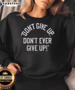 Stylish 'Don't Give Up' sweatshirt featuring motivational text, perfect for inspiring confidence and perseverance in everyday wear.