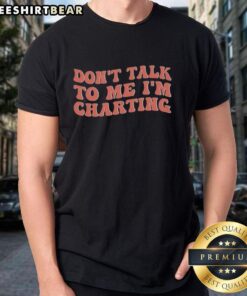 Alt Text: Top Don'T Talk To Me I'M Charting T-Shirt featuring bold text design for chart enthusiasts and introverts.