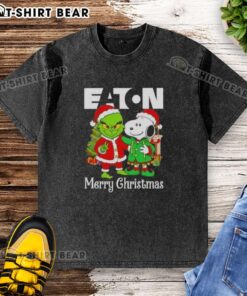Top Eaton Corporation X Grinch and Snoopy Merry Christmas washed t-shirt featuring festive graphics and vibrant colors.