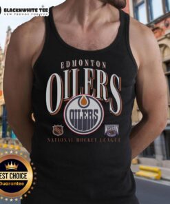 Vintage Edmonton Oilers tank top featuring classic team colors and logo, perfect for fans and collectors.
