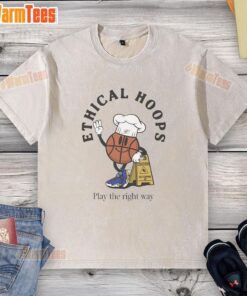 Top Ethical Hoops Play the Right Way washed t-shirt displayed on a hanger, showcasing its soft fabric and stylish design.