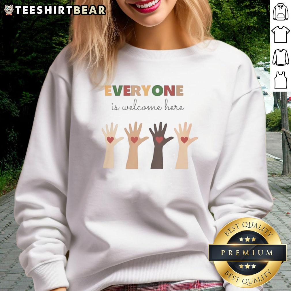 top-everyone-is-welcome-here-sweatshirt Cozy 'Everyone Is Welcome Here' sweatshirt featuring a colorful design, perfect for casual wear and spreading positivity.