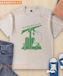 Alt Text: Top flag of Hezbollah design on a washed t-shirt featuring a rifle graphic for stylish activism.