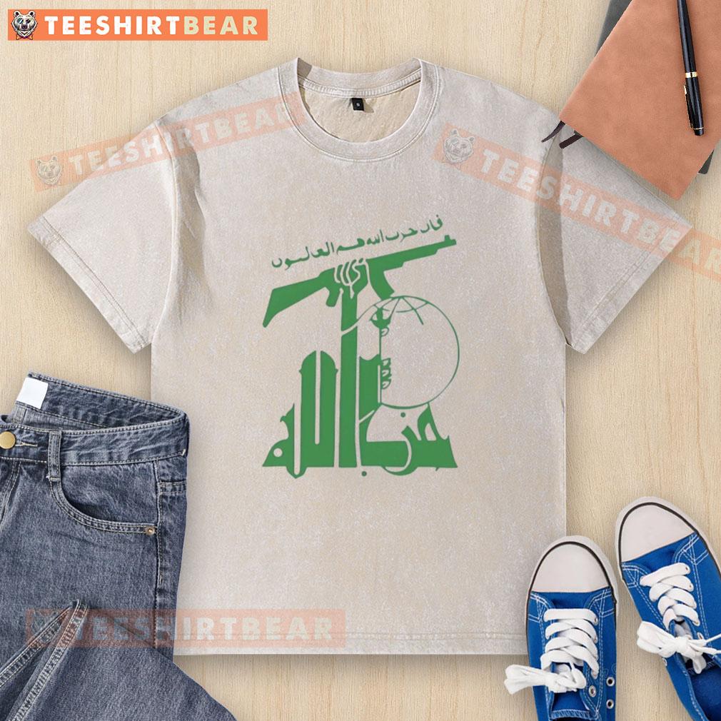 top-flag-of-hezbollah-holding-rifle-washed-t-shirt Alt Text: Top flag of Hezbollah design on a washed t-shirt featuring a rifle graphic for stylish activism.