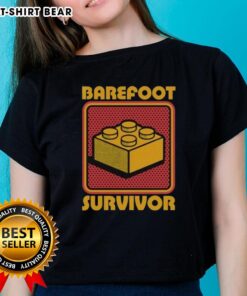 Top Foot Brick Survivor Barefoot Lego Survivor Ladies Tee featuring a playful graphic for Lego enthusiasts.