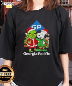 Alt Text: Top Georgia Pacific X Grinch and Snoopy Merry Christmas Ladies Tee featuring festive designs for holiday cheer.