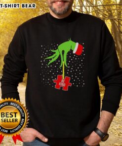 Top Grinch Hand Be Kind Puzzle Autism Awareness Christmas Sweatshirt featuring festive design and vibrant colors.