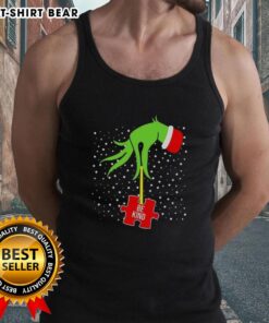 Alt Text: Top Grinch Hand Be Kind Puzzle Autism Awareness Christmas Tank Top featuring colorful design for holiday spirit.