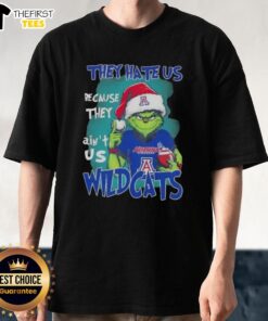 Top Grinch They Hate Us Because They Ain'T Us Arizona Wildcats Christmas T-Shirt featuring festive graphics and team colors.