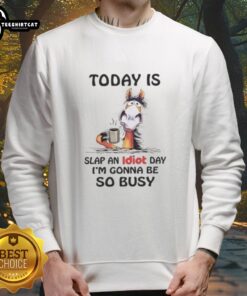 Cozy sweatshirt featuring 'Slap An Idiot Day' design, perfect for horse lovers celebrating humor and fun.