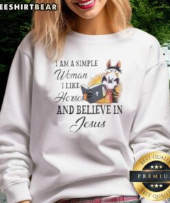 Cozy sweatshirt featuring 'I Am A Simple Woman I Like Horses And Believe In Jesus' design, perfect for casual wear.