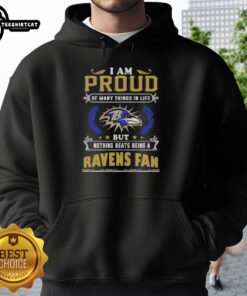 Cozy hoodie featuring 'I Am Proud Of Many Things But Nothing Beats Being A Baltimore Ravens Fan' design.
