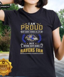 Women's tee featuring 'I Am Proud Of Many Things But Nothing Beats Being A Baltimore Ravens Fan' slogan.