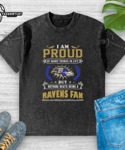 Worn Baltimore Ravens fan T-shirt with the phrase 'I Am Proud Of Many Things In Life But Nothing Beats Being A Ravens Fan'