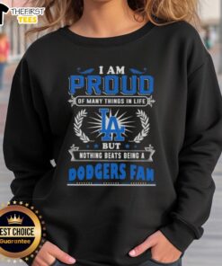 Cozy sweatshirt featuring 'I Am Proud Of Many Things But Nothing Beats Being A Los Angeles Dodgers Fan' design.