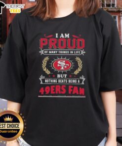 San Francisco 49ers fan ladies tee featuring 'Proud of Many Things, But Nothing Beats Being a 49ers Fan' design.