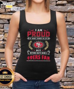 San Francisco 49ers fan proudly wearing a tank top with the phrase 'I Am Proud Of Many Things' in vibrant colors.