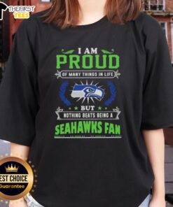 Ladies tee featuring 'I Am Proud Of Many Things But Nothing Beats Being A Seattle Seahawks Fan' design.