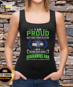 Seattle Seahawks fan wearing a tank top that says 'I Am Proud Of Many Things, But Nothing Beats Being A Seahawks Fan.'