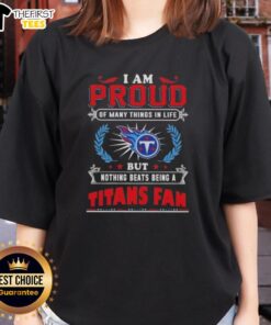 Top I Am Proud Of Many Things In Life but Nothing Beats Being A Tennessee Titans Fan Ladies Tee in blue and white.