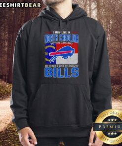 Person wearing a Bills hoodie, showcasing pride for the team while living in North Carolina on game day.