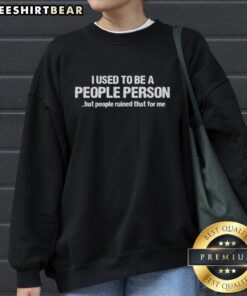 Cozy sweatshirt featuring 'I Used to Be a People Person' quote, perfect for introverts and casual wear.