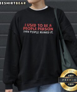 Cozy sweatshirt featuring the phrase 'I Used To Be A People Person, Then People Ruined It' for humorous casual wear.