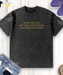 Top Im Not Gay But Matt Stafford Is washed t-shirt featuring bold graphics and vibrant colors for football fans.