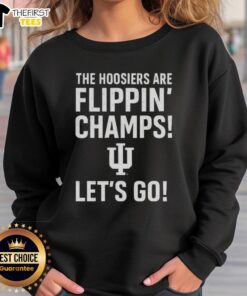 Alt Text: Top Indiana Hoosiers sweatshirt featuring 'The Hoosiers Are Flippin Champs' slogan, perfect for fans and game day.
