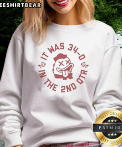 Cozy sweatshirt featuring 'Top It Was 34-0 In The 2nd Qtr' design, perfect for sports fans and game day apparel.