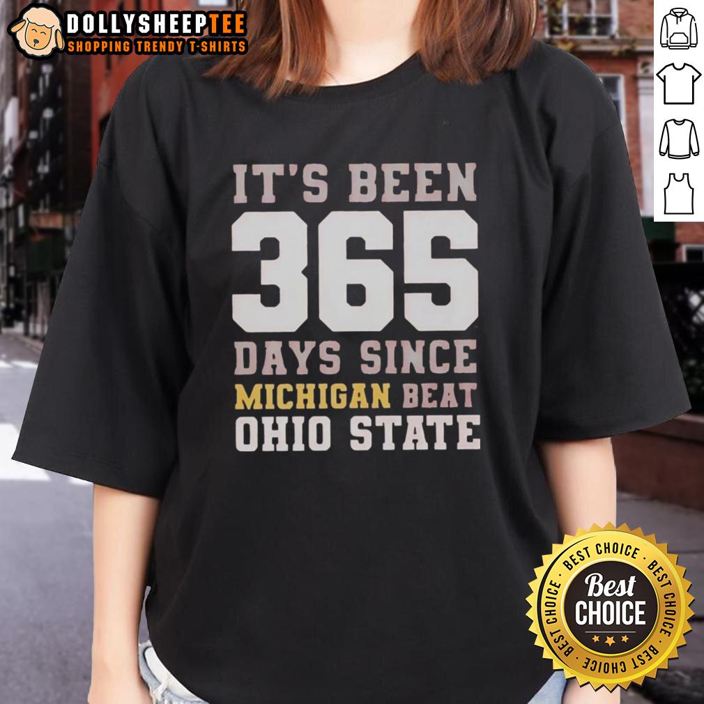Top Its Been 365 Days Since Michigan Beat Ohio State Ladies Tee Top It's Been 365 Days Since Michigan Beat Ohio State Ladies Tee featuring team colors and celebration graphics.
