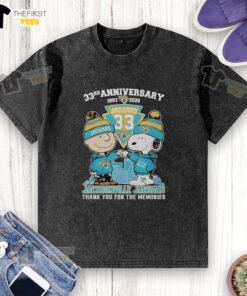 Top Jacksonville Jaguars outfit featuring Snoopy and Charlie Brown, celebrating 33rd anniversary, 1993-2026, washed t-shirt.