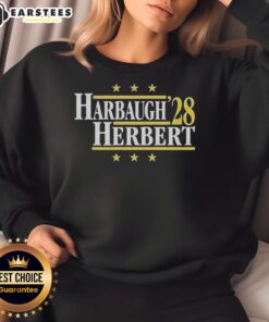 Top Jim Harbaugh vs Justin Herbert Los Angeles Chargers 2028 sweatshirt showcasing bold graphics and team colors.