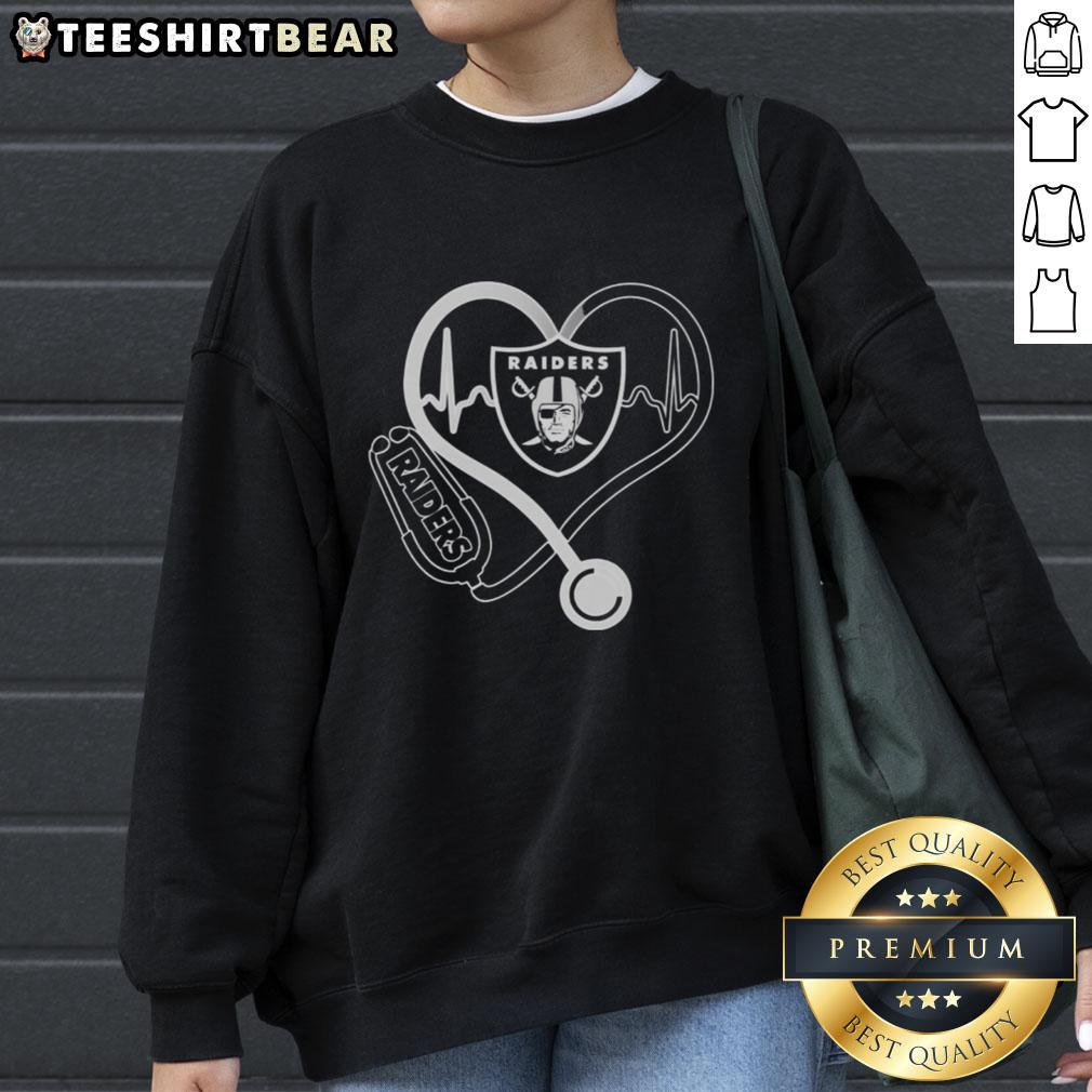 top-love-los-angeles-raiders-stethoscope-headphones-fans-sweatshirt Alt Text: Top Love Los Angeles Raiders stethoscope headphones fans sweatshirt featuring team colors and logo, perfect for fans.