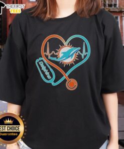 Alt Text: Ladies' Miami Dolphins Tee featuring stethoscope and headphones, perfect for passionate fans.