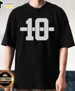 Alt Text: Top view of Marcel Reed Texas A&M Aggies Football Number 10 Stripe T-Shirt in maroon and white colors.