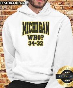 Alt Text: Black hoodie featuring Top Michigan Who 34-32 design, perfect for fans and stylish casual wear.