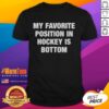 Top My Favorite Position In Hockey Is Bottom T-Shirt featuring a playful hockey graphic and bold text design.