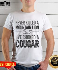 Funny t-shirt featuring the phrase 'Never Killed A Mountain Lion But I've Choked A Cougar' for outdoor and animal lovers.