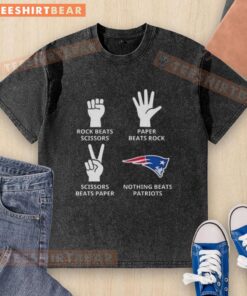 Top New England Patriots washed t-shirt featuring 'Nothing Beats Rock, Scissors, Paper Beats Rock, Scissors Beats Paper' design.