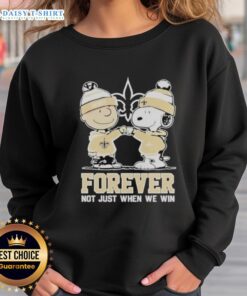 Top New Orleans Saints Charlie Brown and Snoopy Forever sweatshirt featuring playful design for fans and comfort.