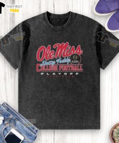 Top Ole Miss Rebels College Football Playoff 2025 Hotty Toddy washed t-shirt in navy blue displayed on a wooden background.