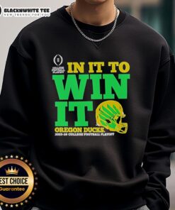 Alt Text: Oregon Ducks 'In It To Win It' CFP 2025-26 helmet sweatshirt, featuring team logo and vibrant colors for fans.