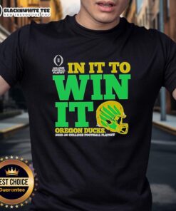 Alt Text: Oregon Ducks In It To Win It CFP 2025-26 helmet t-shirt showcasing team spirit and winning attitude.