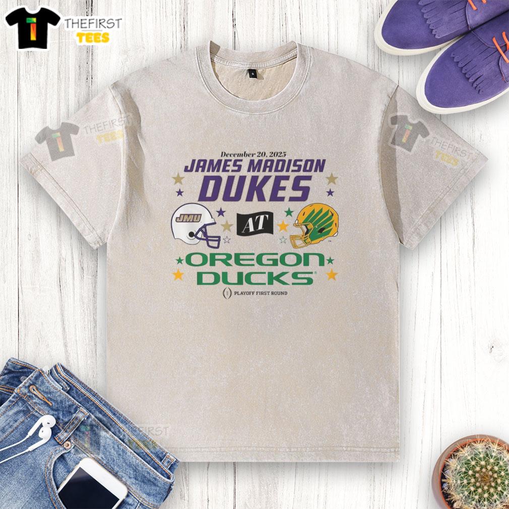 top-oregon-ducks-jmu-dukes-2025-cfp-first-round-matchup-washed-t-shirt Top Oregon Ducks vs JMU Dukes 2025 CFP First Round Matchup washed t-shirt featuring team logos and vibrant colors.