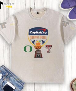 Alt Text: 2026 Capital One Orange Bowl logo on a washed t-shirt featuring Oregon Ducks vs Texas Tech Red Raiders design.