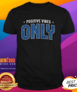Alt Text: Top Orlando Magic Positive Vibes Only T-Shirt featuring vibrant colors and team logo, perfect for fans.