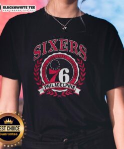 Retro ladies tee featuring the Philadelphia 76ers logo framed by a laurel wreath, perfect for NBA fans.